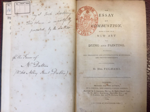 Open book showing the title of the book written by elizabeth fulhame, the chemist who discovered photoreduction and invented the concept of catalysis